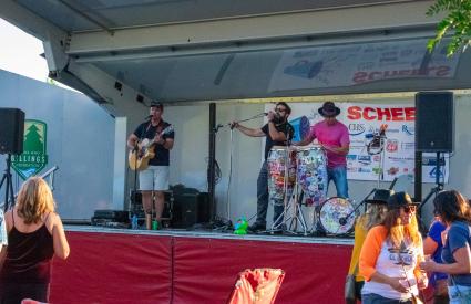 A band plays at CommUnity Rally