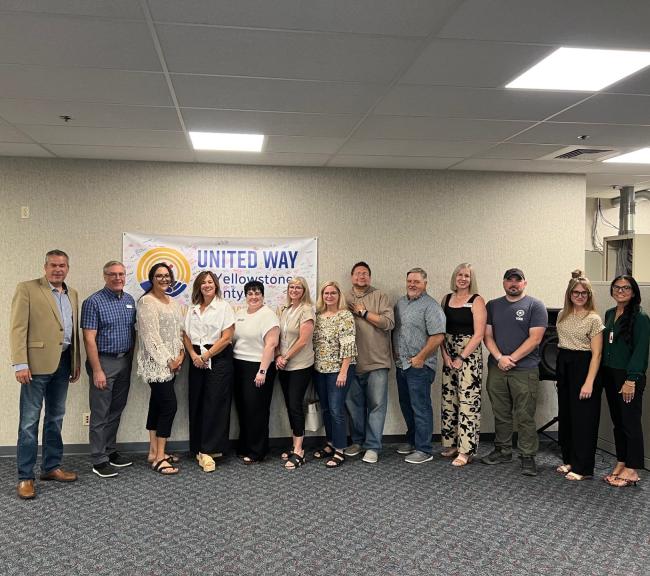 Local nonprofit leaders whose organizations received a grant from UWYC pose for a photo